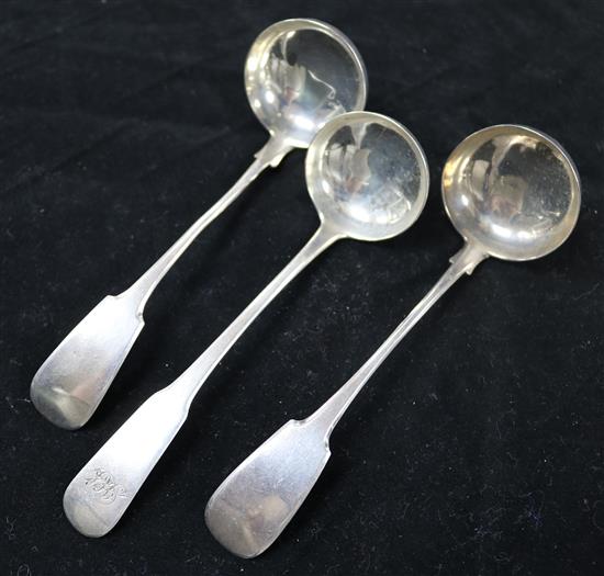 A pair of early 19th century Scottish provincial silver fiddle pattern cream ladles by R & R Keay, Perth, 2.5 oz.